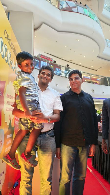 Coach P.S.Jaikishan at Crossword Book-A-Thon event with student