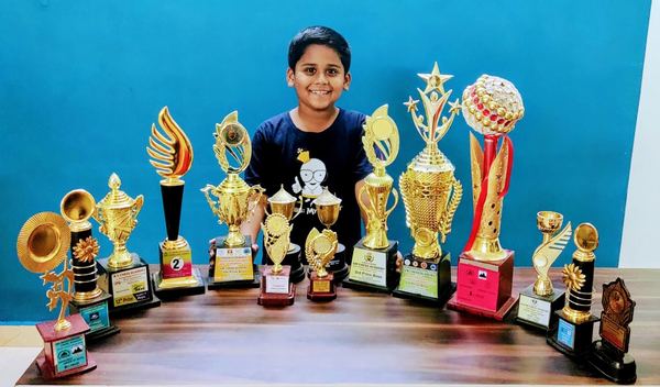 Lishanth Balaji, Mindful Movers student, with 11+ tournament trophies
