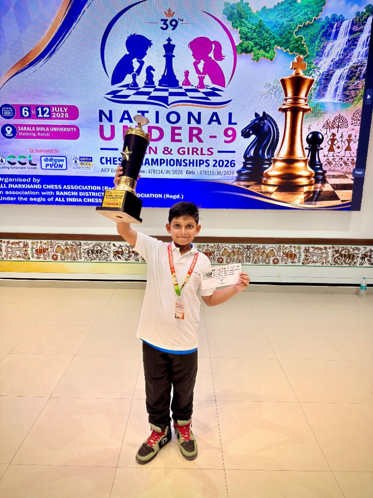 Rayaan holding 1st prize trophy as National Under-9 Chess Champion (July 2026, Ranchi)